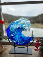 Indoor glass sculpture on custom steel base