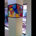Lit Column Architectural installation of four lighted art glass panels enclosing a support column section.