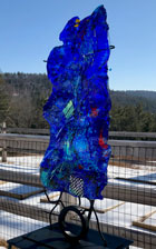 Outdoor glass sculpture titled "Cruisin' With the Blue"