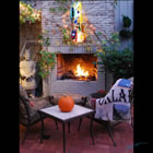 LIghted Fireplace Kiln-Fomred Glass Sculpture Lighted float-mounted kiln-formed glass sculpture on an outdoor fireplace