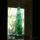 Kiln formed glass sculpture titled "Green Zen"